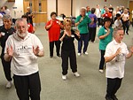 The man on the left front is a tai chi teacher for more than 40 years and still coming to the Florida USA, Oct 2003 workshop - an inspiration for us all